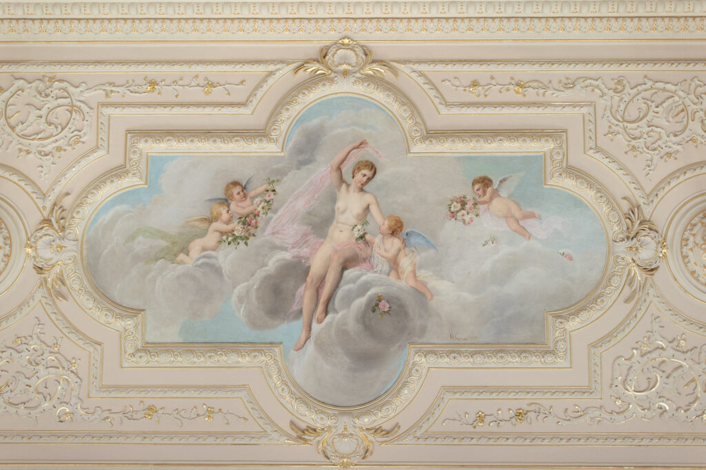 Ornate painted ceiling at Pousada Palacio de Estoi in Portugal